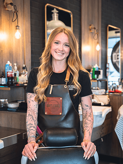Becca, barber at Bootlegged Barber