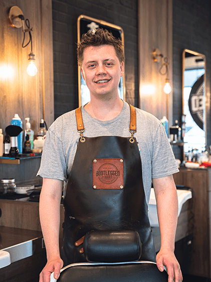 Kanion, barber at Bootlegged Barber